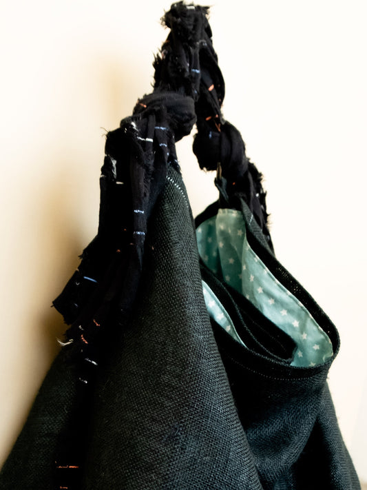 Borsa in juta nera vista laterale