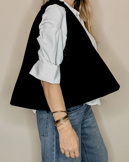 Borsa reversibile Peggie in lato lana, vista indossata
