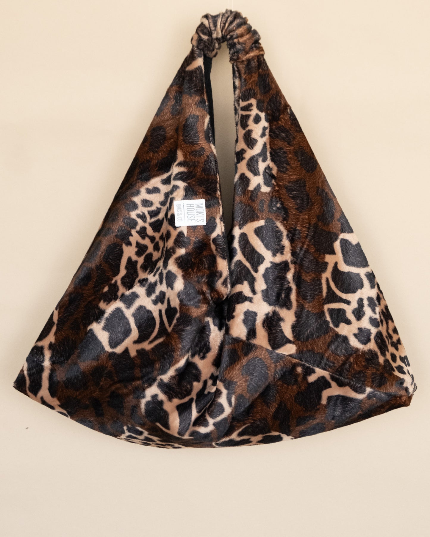 Borsa reversibile Lina in cavallino sintetico con stampa animalier