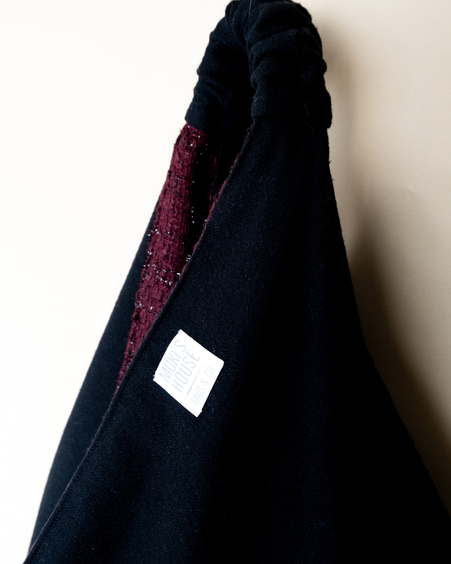 Borsa Claudine reversibile lato misto lana particolare manico
